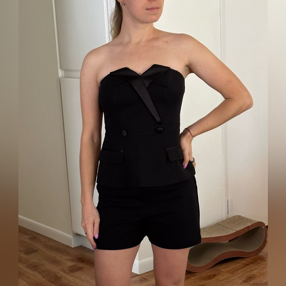 Bebe black suit: shorts and top. New. Body suit